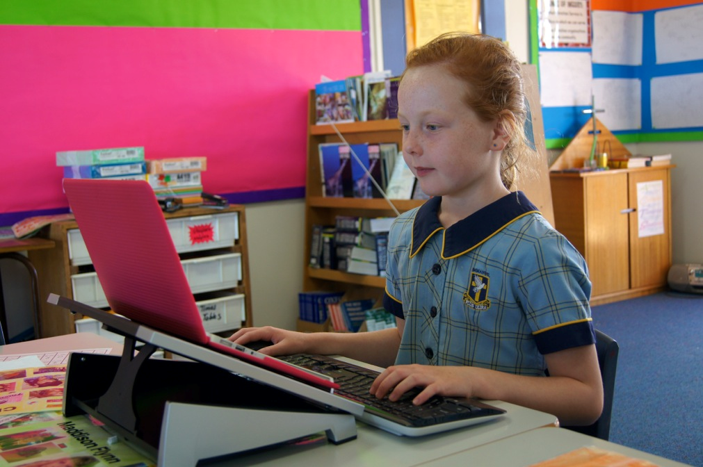 Good posture with Fellowes Laptop Stand, keyboard and mouse.